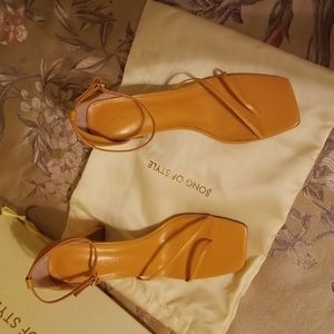 High heel shoes. Tangerine color. 3.75" heel. Never worn. Size 9.5
